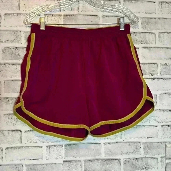 Under Armour Pants - Under Armor shorts size Lg purple and neon green/yellow trim workout casual wear